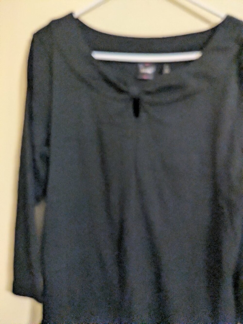 Lightweight sweater with pretty neckline.
